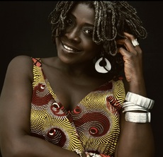 Akua in her trademark African fashion