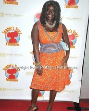 Akua in her trademark African fashion, on the red carpet at Boris and Nicole's fundraising cocktail